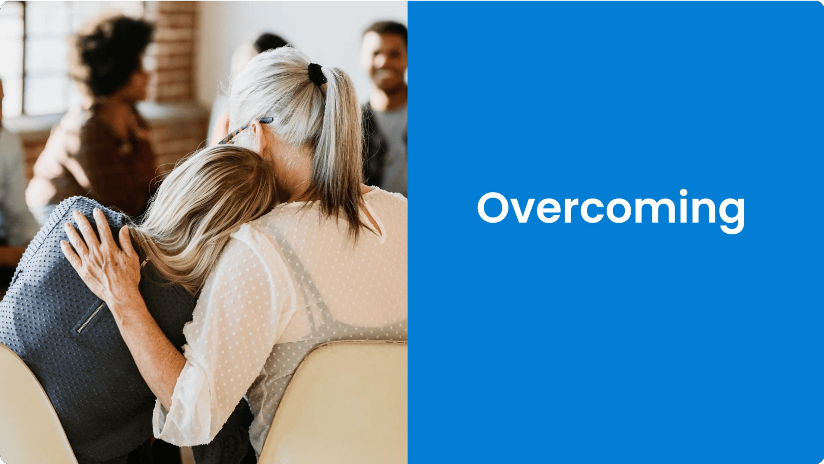 Women embracing, text 'Overcoming' on blue background.